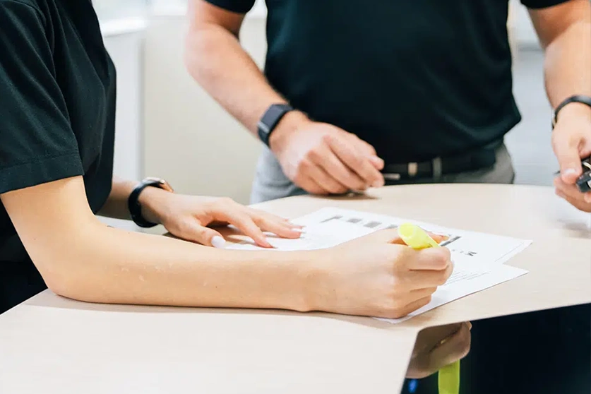 man and woman looking over paperwork